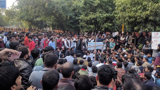 1200px-JMI_students_and_locals_protesting_against_CAA_NRC-1-678x381.jpg